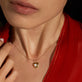Image of 10K Yellow Gold Heart And Soul Diamond Charm on Models Neck