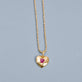 Stone and Strand 10K Yellow Gold Heart And Soul Ruby Necklace Editorial Image