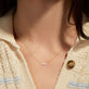 Image of 10K Yellow Gold Heart, Mom Diamond Necklace on Models Neck