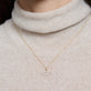 Image of 14K Yellow Gold Hebrew Mothers Day Necklace on Models Neck