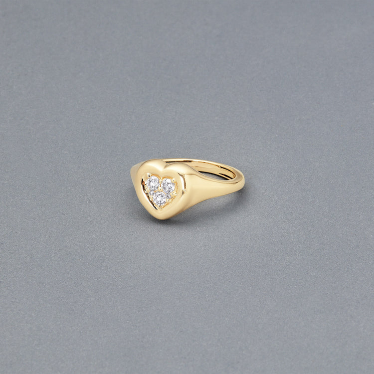 Stone and Strand 14K Yellow Gold Hold My Heart Signet Ring Editorial Image
