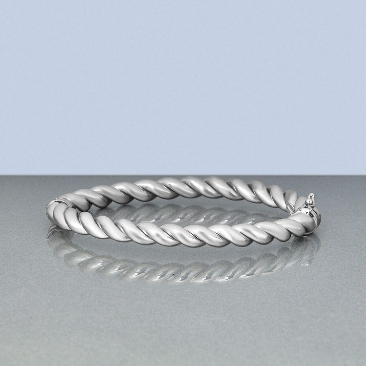 Stone and Strand Serling Silver In A Twist Silver Bangle Editorial Image