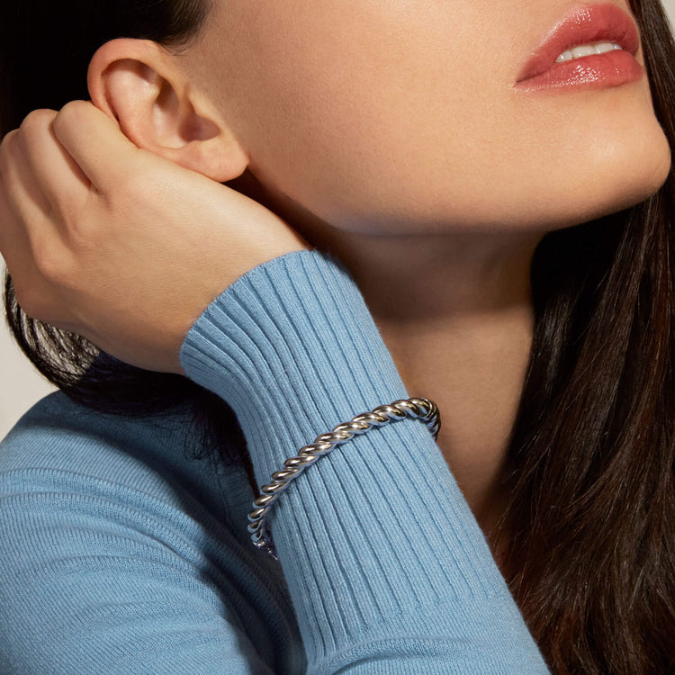 Image of Sterling Silver In A Twist Silver Bangle on Models Arm