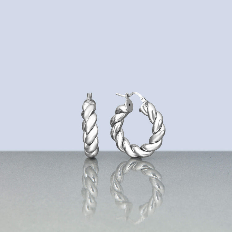 Stone and Strand Sterling Silver In A Twist Silver Hoops Editorial Image
