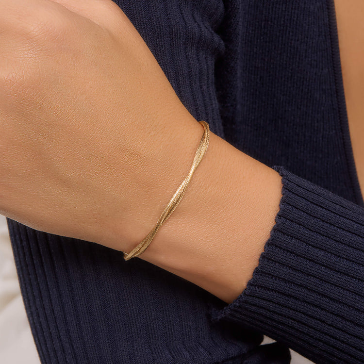 Image of 14K Yellow Gold Interwoven Gold Bracelet on Models Arm
