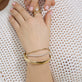 Image of 14K Yellow Gold Interwoven Gold Bracelet with Stone and Strand Bracelets