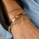 Image of 14K Yellow Gold Je Ne Regrette Gold Bangle with Stone and Strand Bracelets