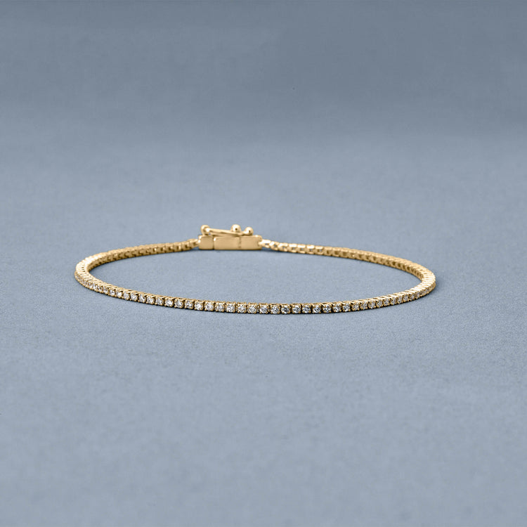Stone and Strand 14K Yellow Gold LAB-Created Dainty Diamond Tennis Bracelet Editorial Image