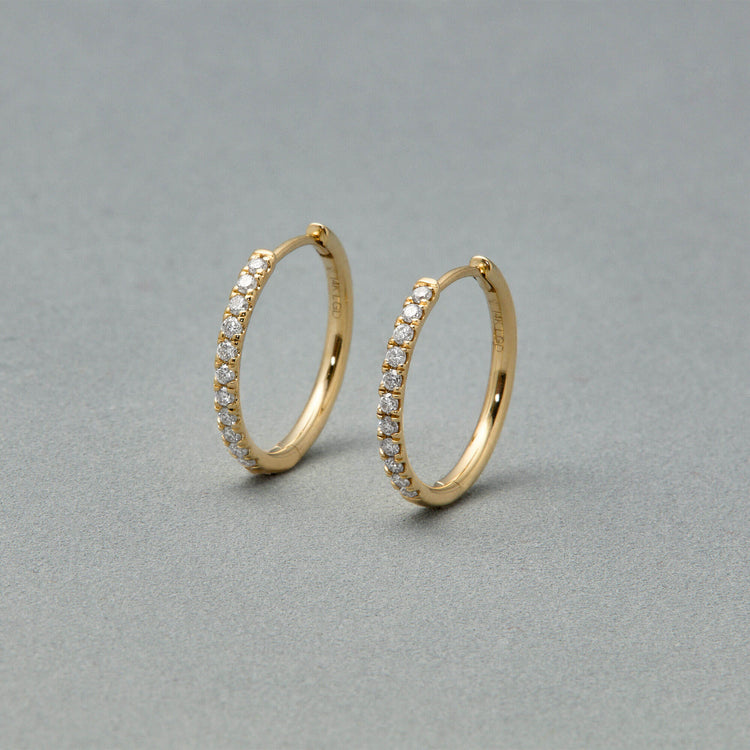 Stone and Strand 14K Yellow Gold Lab-Created Diamond Huggies Editorial Image