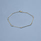 Stone and Strand 14K Yellow Gold LAB-Created Diamond Morse Code Anklet Editorial Image