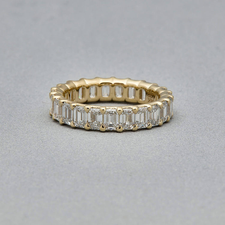 Stone and Strand 14K Yellow Gold Lab-Created Emerald Cut Eternity Band Editorial Image