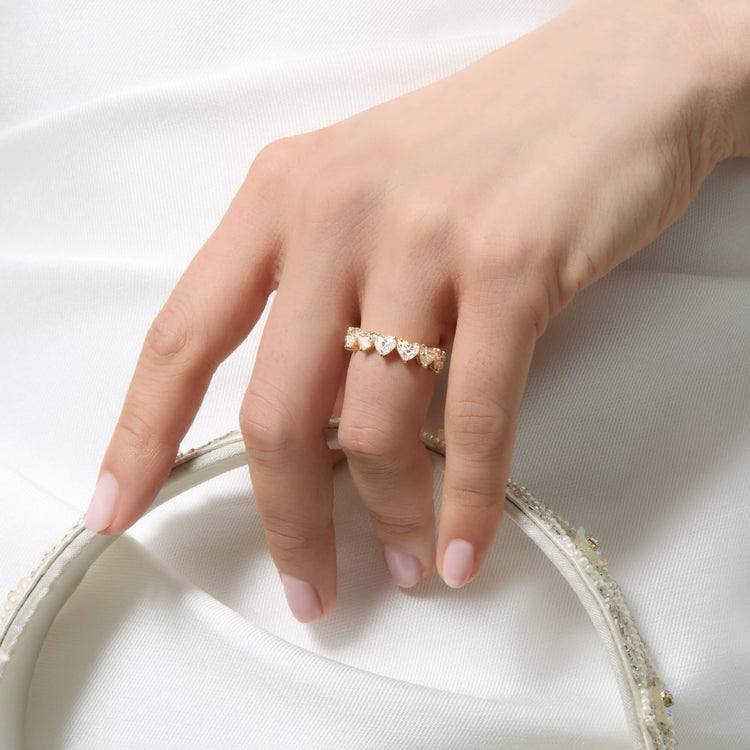 Image of 14K Yellow Gold Lab-Created Heart Eternity Band on Models Hand