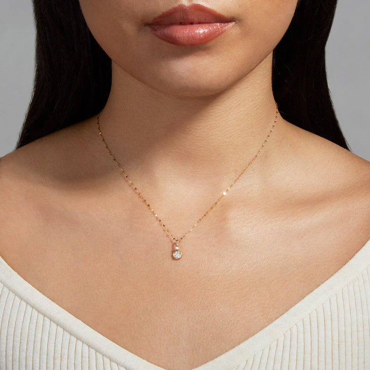 Image of 14K Yellow Gold Lab-Created Round Diamond Bonbon Charm on Models Neck