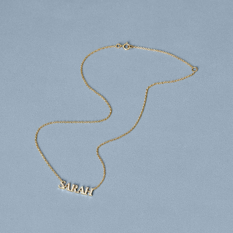 Stone and Strand 14K Yellow Gold LAB-Created Serif Nameplate Necklace Editorial Image