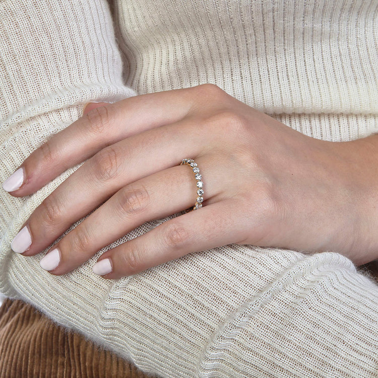 Image of 14K Yellow Gold LAB-Created Shared Prong Eternity Band on Models Hand