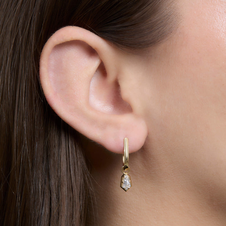 Image of 14K Yellow Gold LAB-Created Shield Diamond Huggies on Models Ear