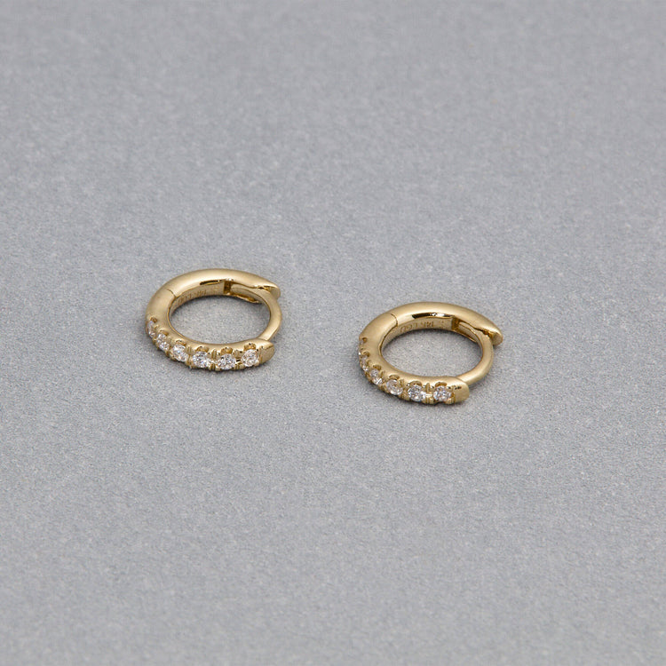 Stone and Strand 14K Yellow Gold Lab-Created Third Hole Huggies Editorial Image