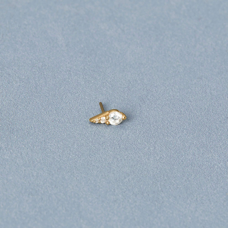 Stone and Strand 14K Yellow Gold LAB-Created To The Second Hole Flat Back Piercing Earring Editorial Image