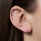 Image of 14K Yellow Gold LAB-Created Triangle Point Second Hole Flat Back Piercing Earring on Models Ear