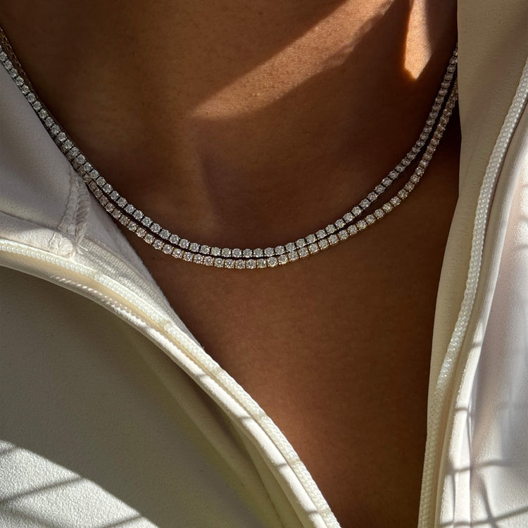 Model wearing Lab-Created Unflippable Necklace in Yellow Gold with solid gold Stone and Strand jewelry