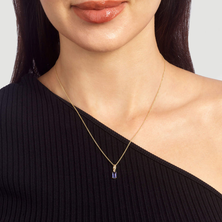 Image of 10K Yellow Gold Lakeside Tanzanite Necklace with Tanzanite on Models Neck