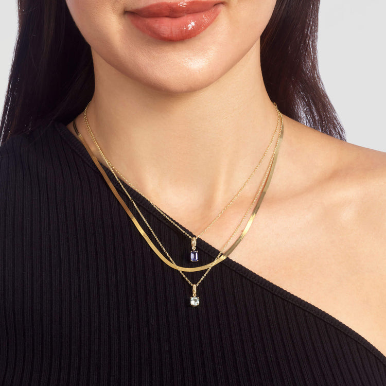 Image of 10K Yellow Gold Lakeside Tanzanite Necklace on Models Neck