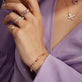 Model wearing Lavender Haze Tennis Bracelet with solid gold Stone and Strand jewelry