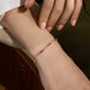 Image of 10K Yellow Gold Lavender Haze Tennis Bracelet with Pink Amethyst and Pink Topaz on Models Arm