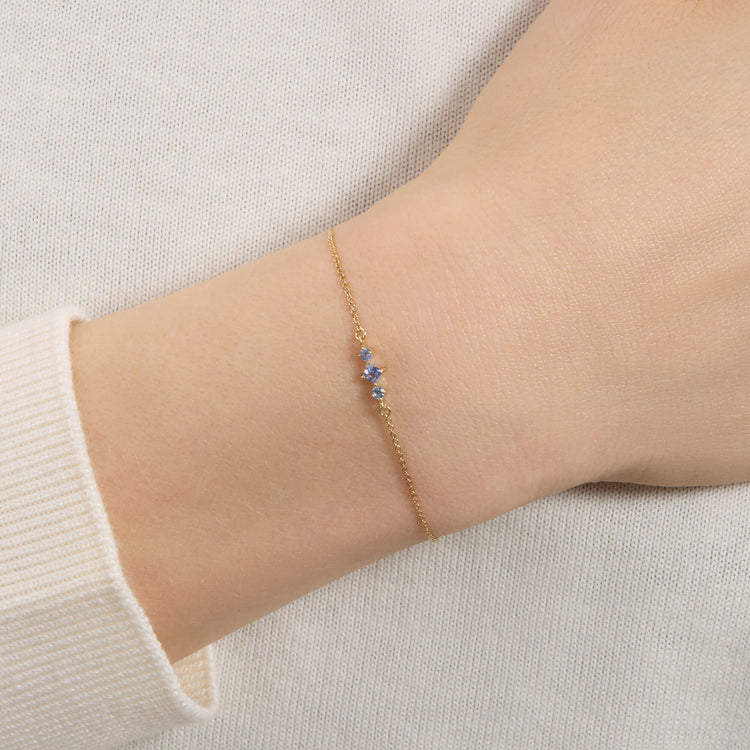 Image of 10K Yellow Gold Le Bleu Slider Bracelet on Models Ear