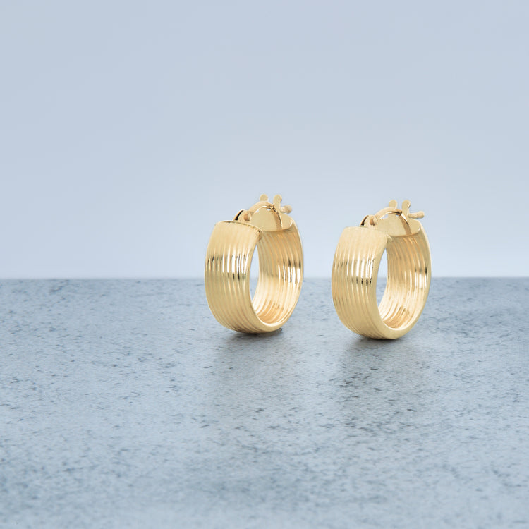 Stone and Strand 14K Yellow Gold Le Groove Huggies Editorial Image