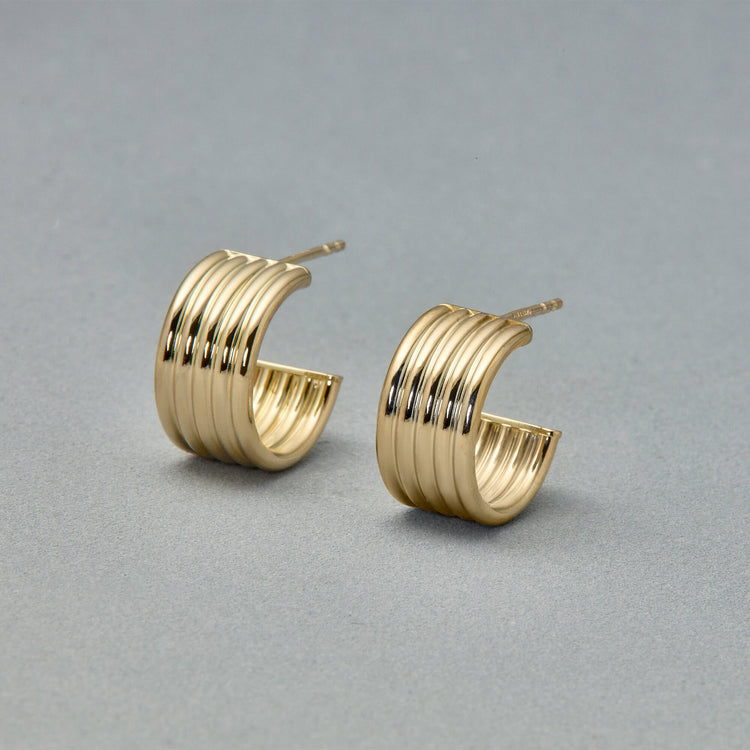 Stone and Strand 14K Yellow Gold Linear Ridge Hoops Editorial Image