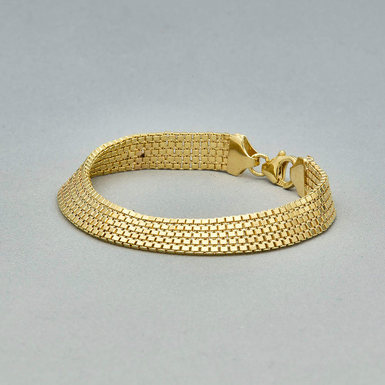 Stone and Strand 14K Yellow Gold Timeless Liquid Gold Bracelet Editorial Image
