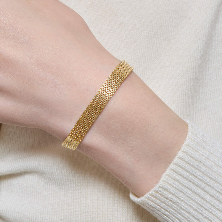 Image of 14K Yellow Gold Timeless Liquid Gold Braceleton Models Arm