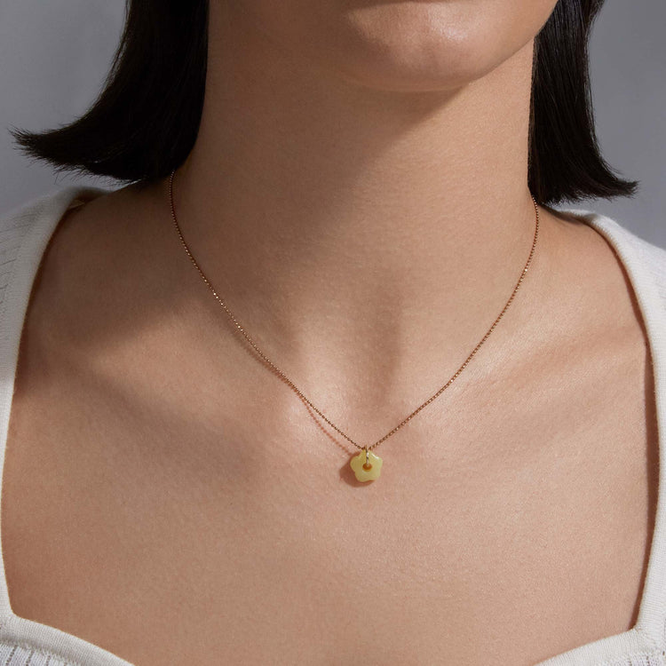 Image of 10K Yellow Gold Little Buttercup Jasper Charm on Models Neck