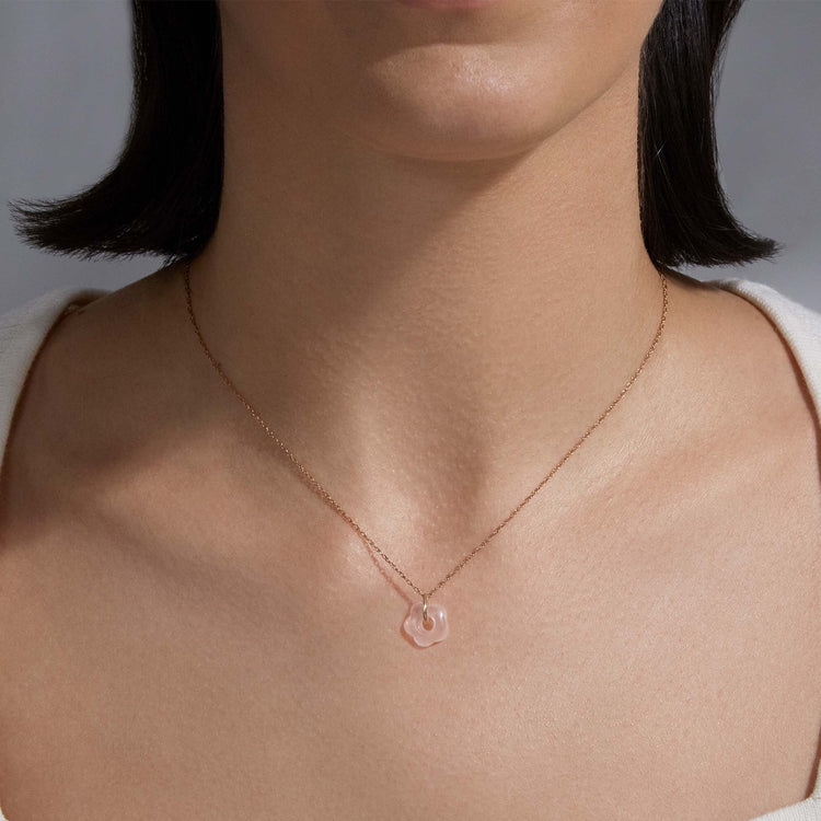 Image of 10K Yellow Gold Little Buttercup Rose Quartz Charm on Models Neck