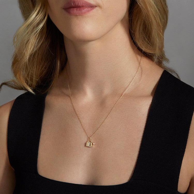 Image of 14K Yellow Gold Love Lock Diamond Initial Charm on Models Neck