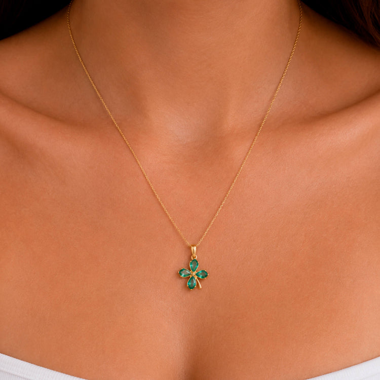 Image of 10K Yellow Gold Lucky Clover Emerald Charm on Models Neck