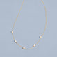 Stone and Strand 10K Yellow Gold Lucky Pearl Necklace Editorial Image