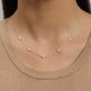 Image of 10K Yellow Gold Lucky Pearl Necklace on Models Neck