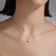 Image of 10K Yellow Gold Lucky Star Charm with Lemon Jasper on Models Neck