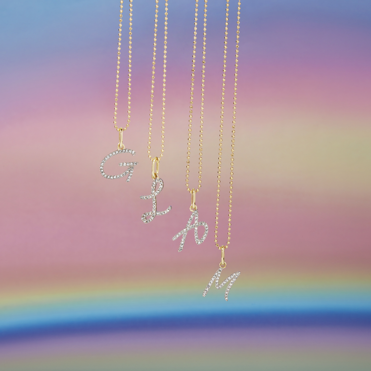 Still life image of Large Pave Scripted Initial Charm Diamond Necklace with Stone and Strand solid gold jewelry