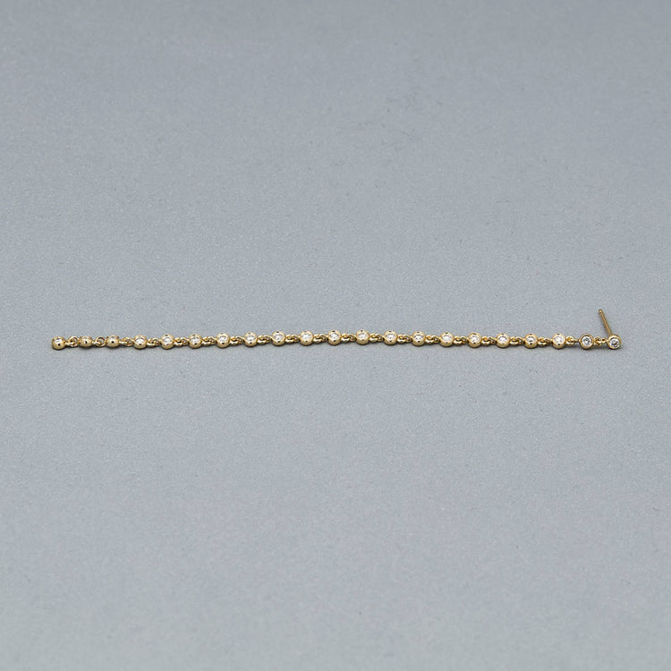 Stone and Strand 14K Yellow Gold Long Diamond Stream Earring Editorial Image