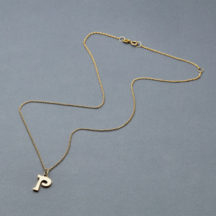 Stone and Strand 14K Yellow Gold Marais Gold Initial Necklace Editorial Image