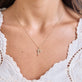 Image of 14K Yellow Gold Marais Gold Initial Necklace on Models Neck
