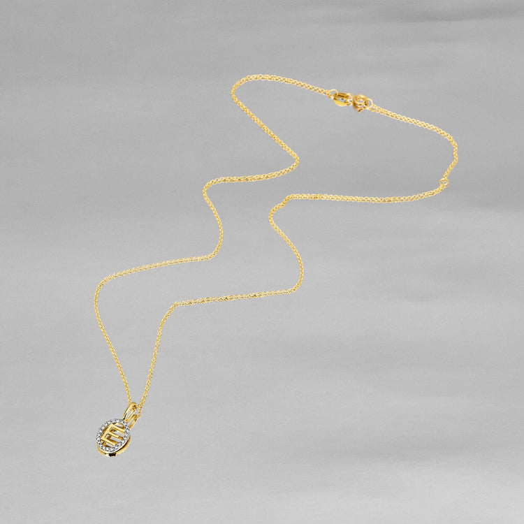 Stone and Strand 10K Yellow Gold Marquee Diamond Initial Necklace Editorial Image