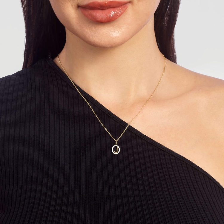 Image of 10K Yellow Gold Marquee Diamond Initial Necklace on Models Neck