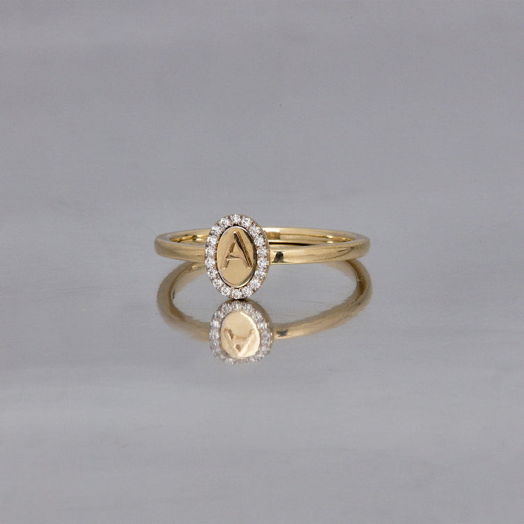 Stone and Strand 10K Yellow Gold Marquee Diamond Initial Ring Editorial Image