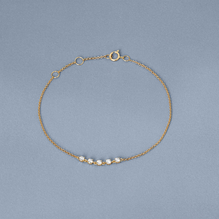 Stone and Strand 14K Yellow Gold Meaningful Diamonds Bracelet Editorial Image