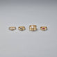 Still life image of Ruby Bonbon Merge Ring with Stone and Strand solid gold jewelry