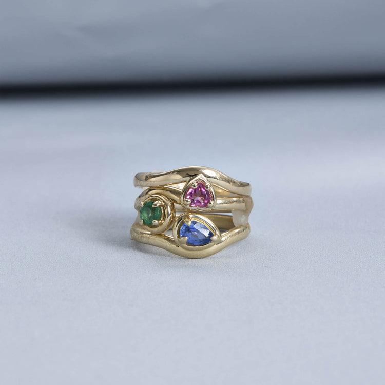 Still life image of Green With Envy Merge Ring with Stone and Strand solid gold jewelry
